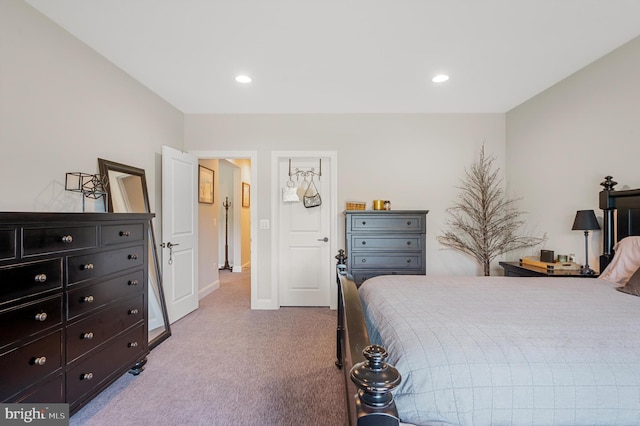 bedroom with light carpet