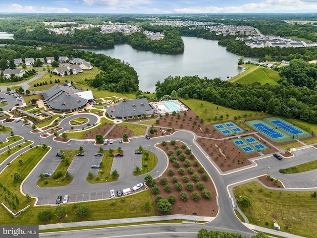 birds eye view of property with a water view