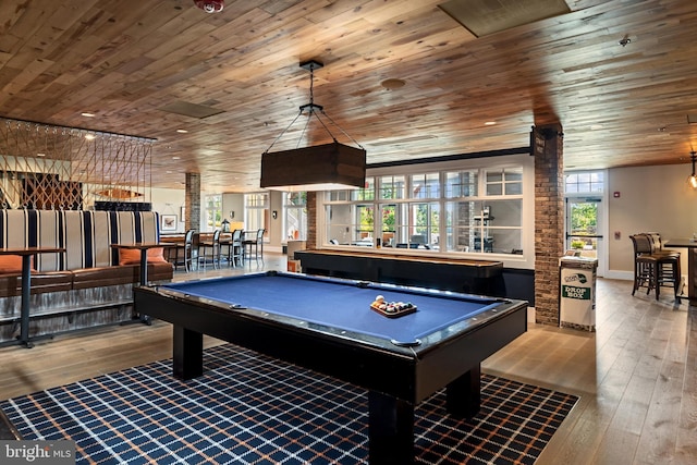 playroom with hardwood / wood-style floors, wooden ceiling, and pool table