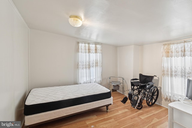 bedroom featuring hardwood / wood-style flooring