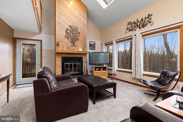 carpeted living room featuring high vaulted ceiling