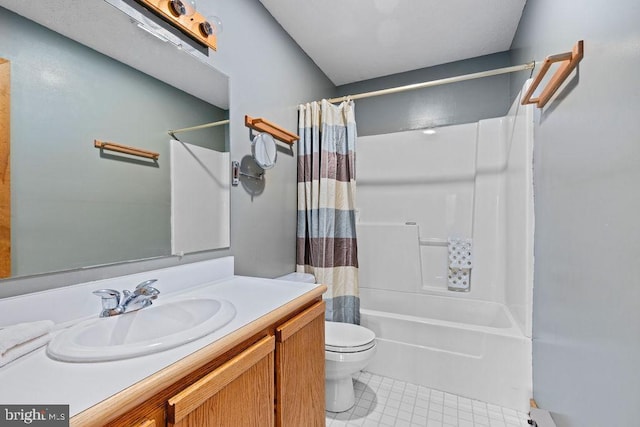 full bathroom featuring shower / bath combo, vanity, toilet, and tile patterned floors