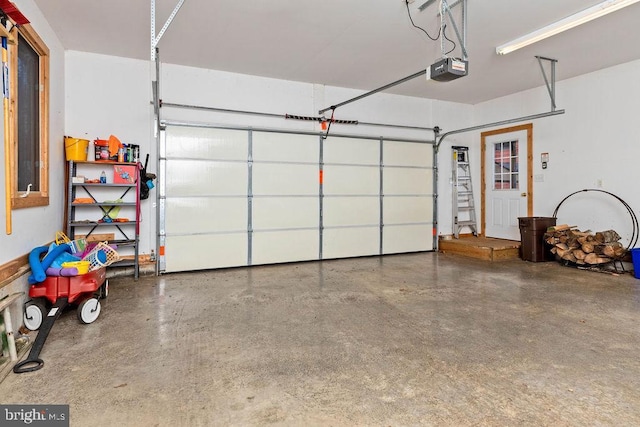 garage featuring a garage door opener