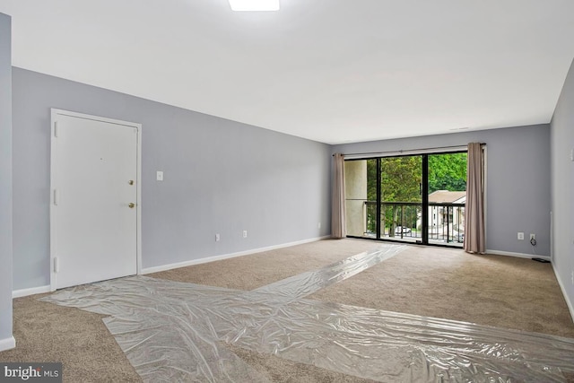 10137 Prince Pl Unit 203-6B, Upper Marlboro, MD 20774 - unfurnished room with carpet flooring and baseboards