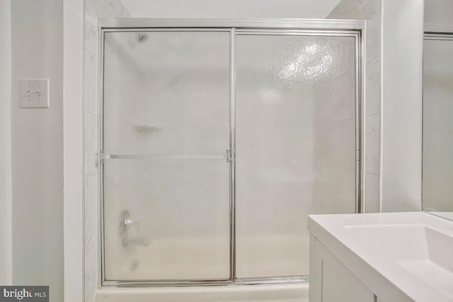 10137 Prince Pl Unit 203-6B, Upper Marlboro, MD 20774 - full bathroom with a shower with door and vanity
