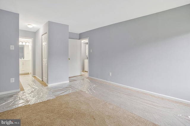 10137 Prince Pl Unit 203-6B, Upper Marlboro, MD 20774 - empty room with baseboards and light carpet