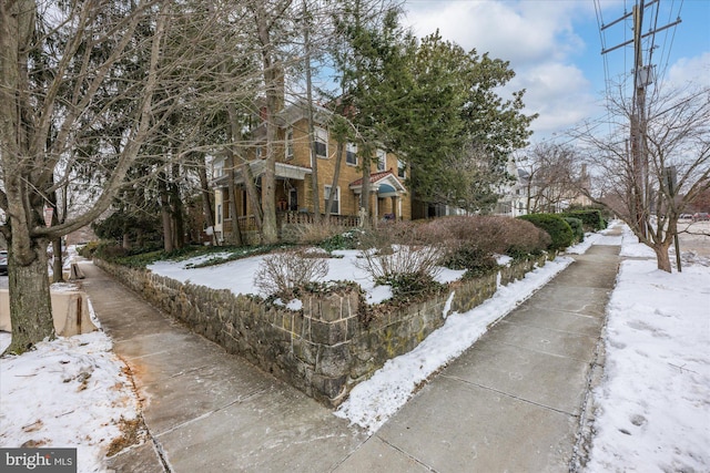 view of snow covered property