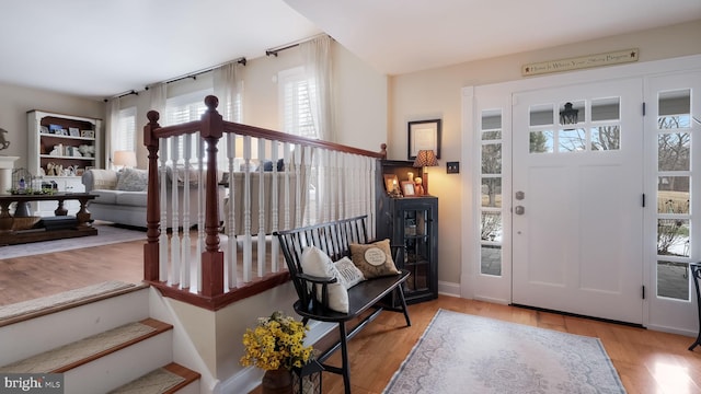 entryway with light hardwood / wood-style floors and a wealth of natural light