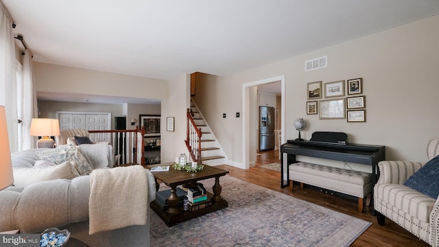 living room with dark wood-type flooring