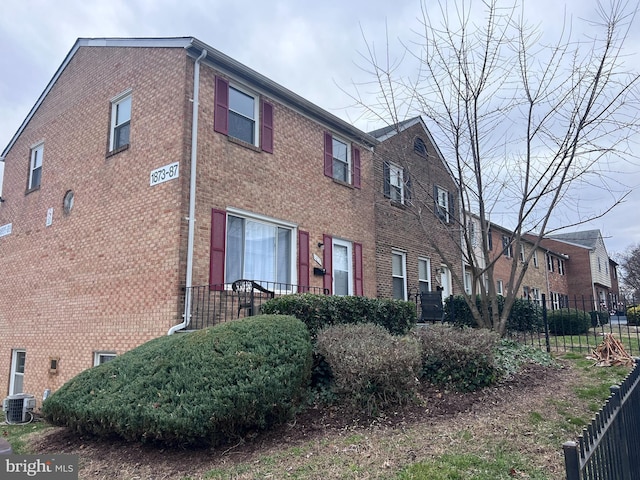 view of property exterior with central AC unit