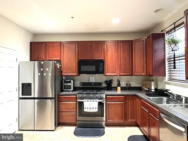 kitchen with sink and stainless steel appliances