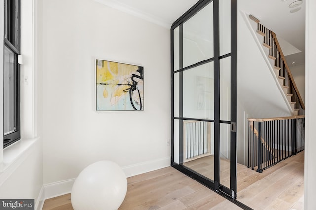 doorway to outside featuring light wood-type flooring