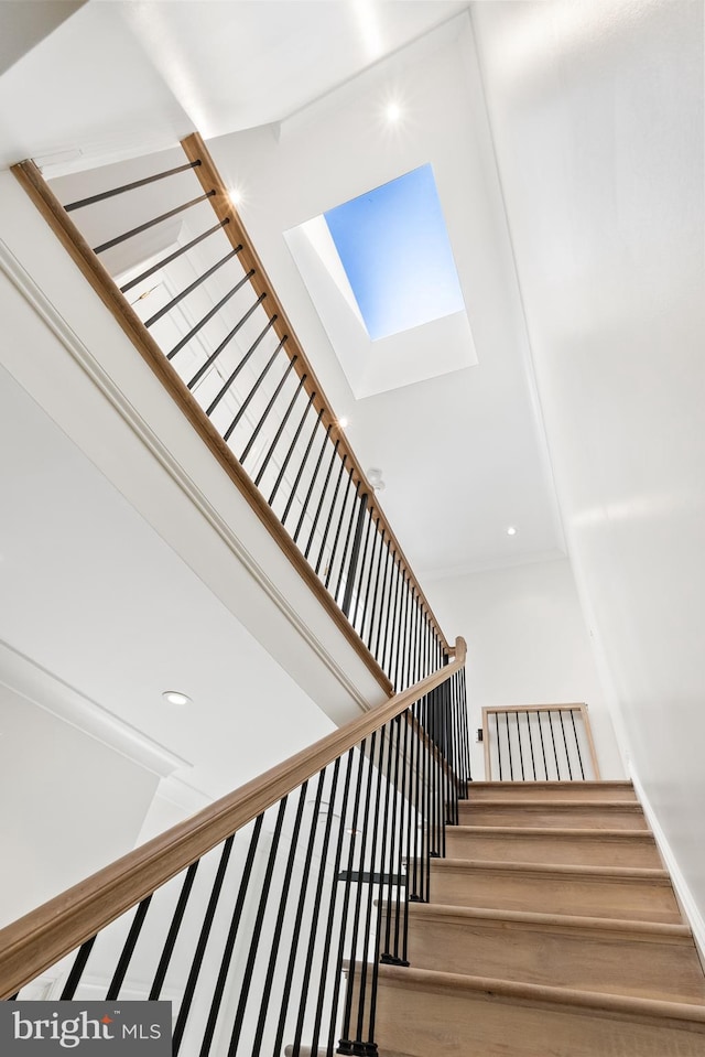 stairway with a skylight