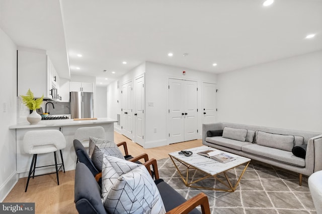 living room featuring light wood-type flooring