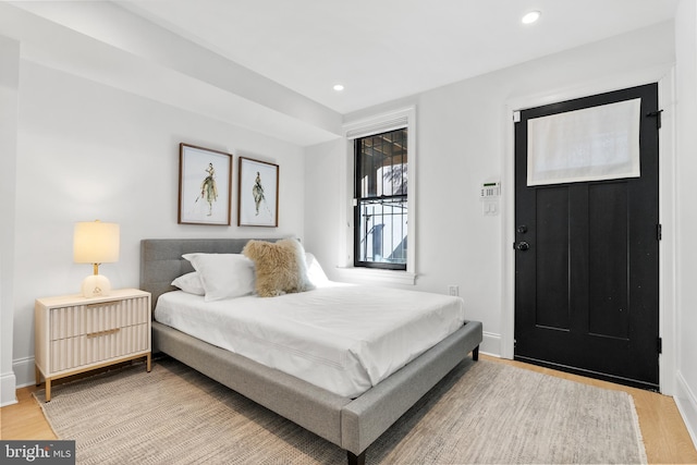 bedroom featuring hardwood / wood-style flooring