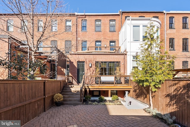 rear view of house featuring a patio area