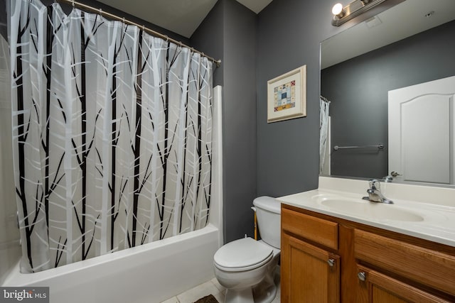 full bathroom featuring toilet, shower / bath combination with curtain, vanity, and tile patterned floors