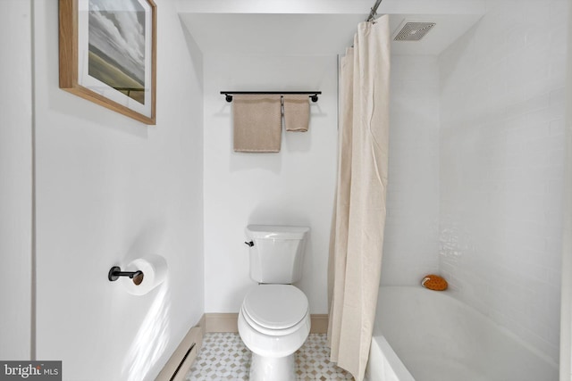 bathroom featuring shower / bath combo, a baseboard radiator, and toilet