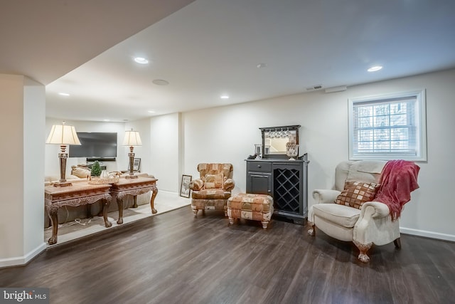 living area featuring dark hardwood / wood-style flooring