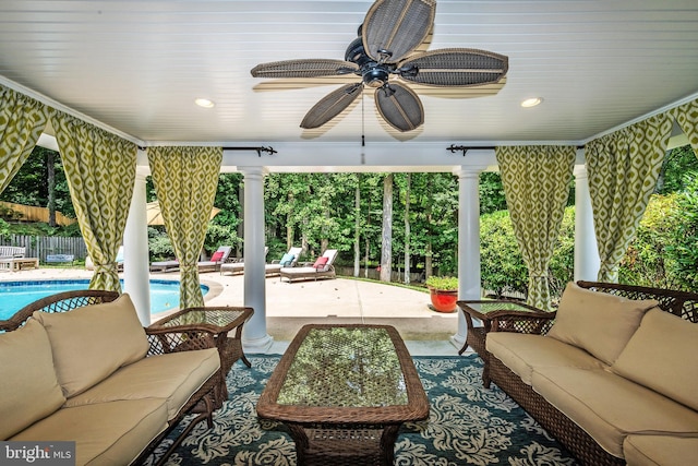 view of patio featuring an outdoor living space and ceiling fan