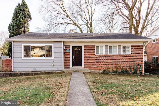 view of front of property with a front lawn