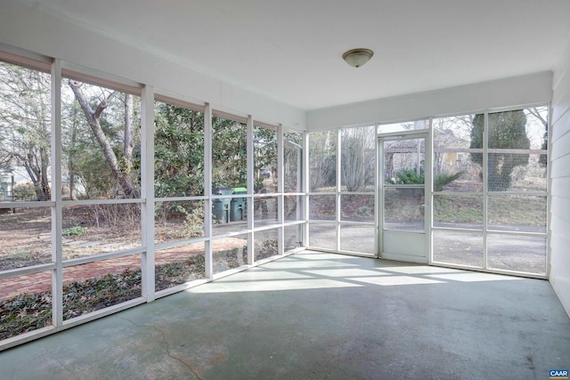 unfurnished sunroom featuring a wealth of natural light