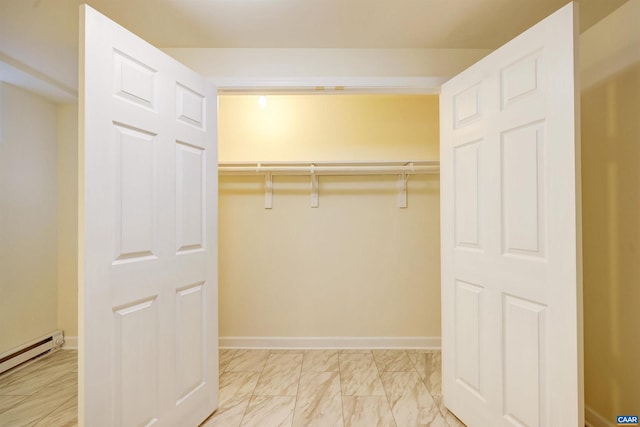 closet with a baseboard radiator