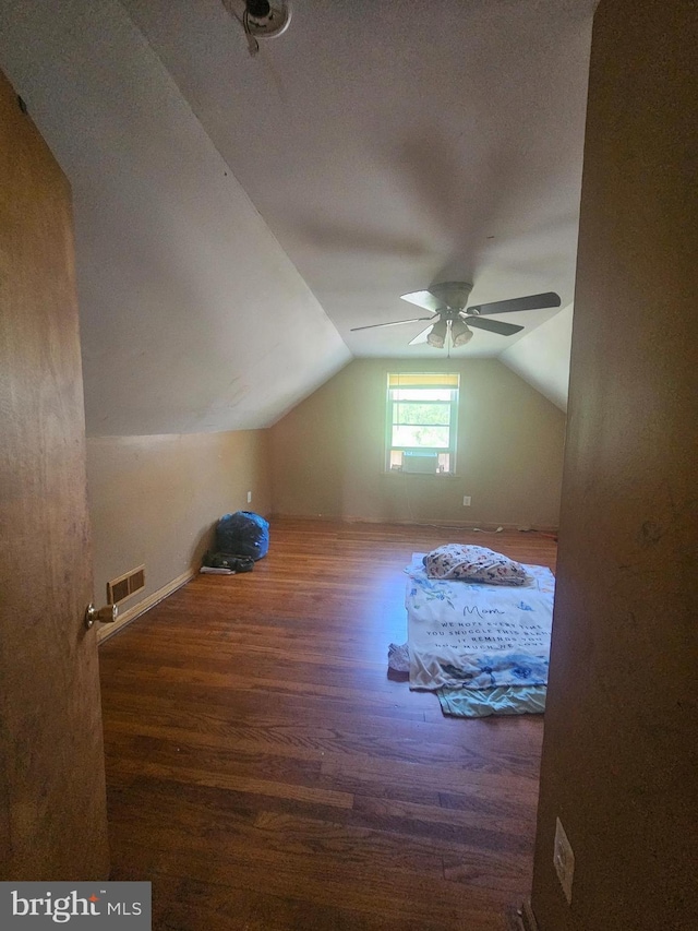 bonus room with visible vents, wood finished floors, a ceiling fan, and vaulted ceiling