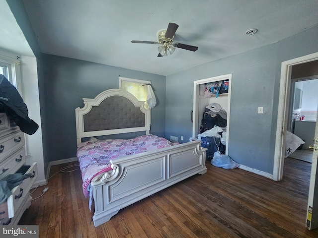 bedroom with baseboards, wood finished floors, and ceiling fan