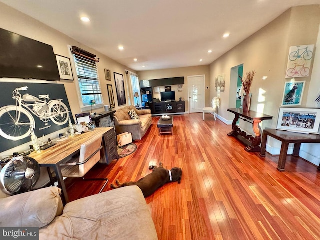 living room with light hardwood / wood-style floors