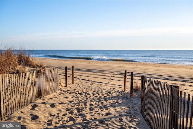 water view featuring a beach view