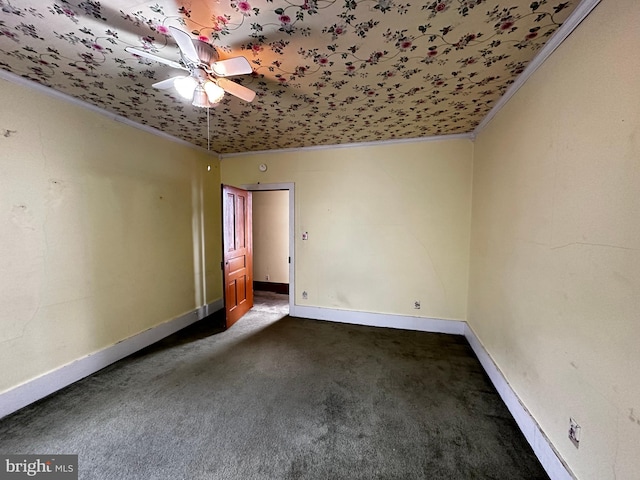 carpeted empty room featuring ceiling fan and ornamental molding