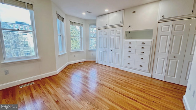 unfurnished bedroom featuring light hardwood / wood-style floors