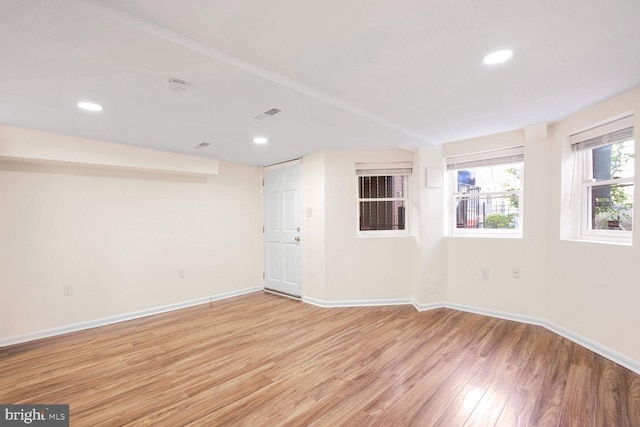 spare room with light wood-type flooring