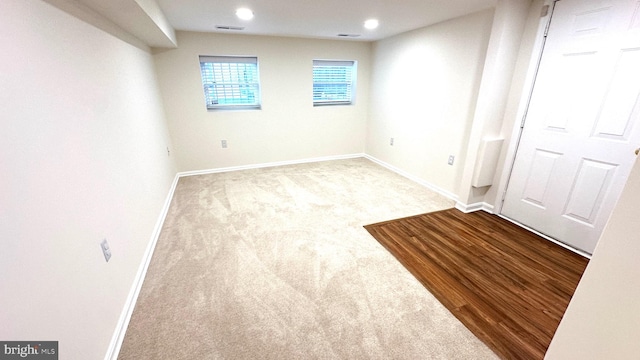 spare room featuring light hardwood / wood-style flooring