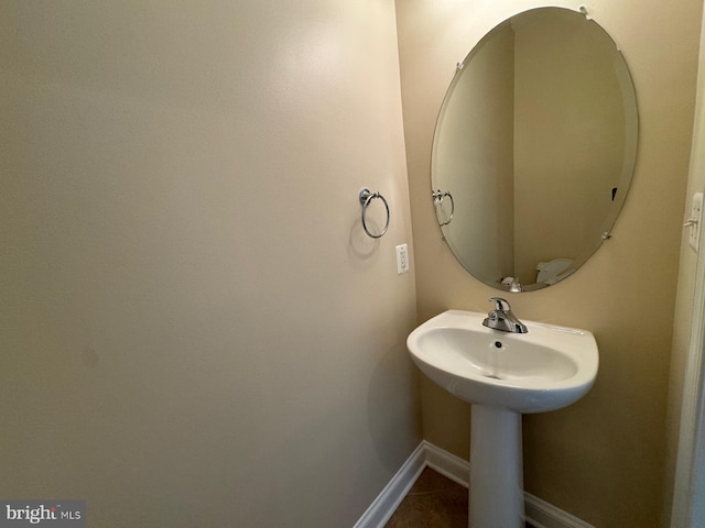 bathroom featuring tile patterned flooring