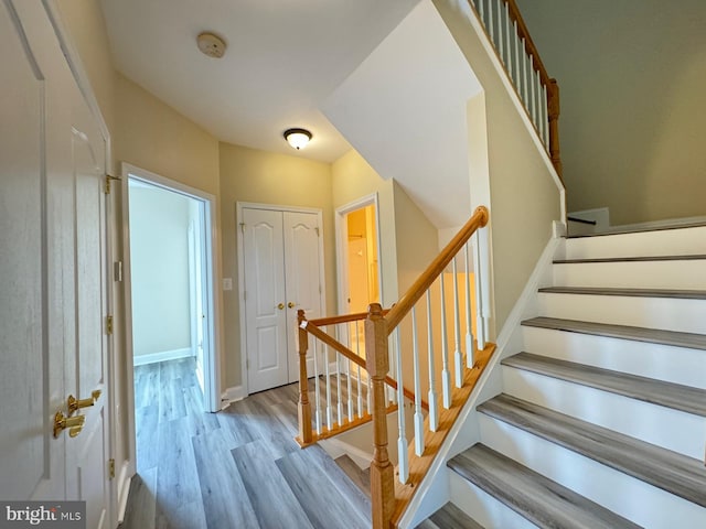 stairway with wood-type flooring