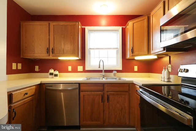 kitchen featuring stainless steel appliances and sink