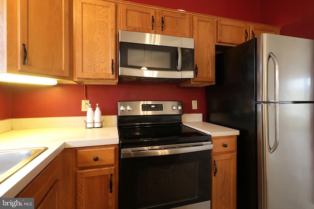 kitchen featuring sink and appliances with stainless steel finishes