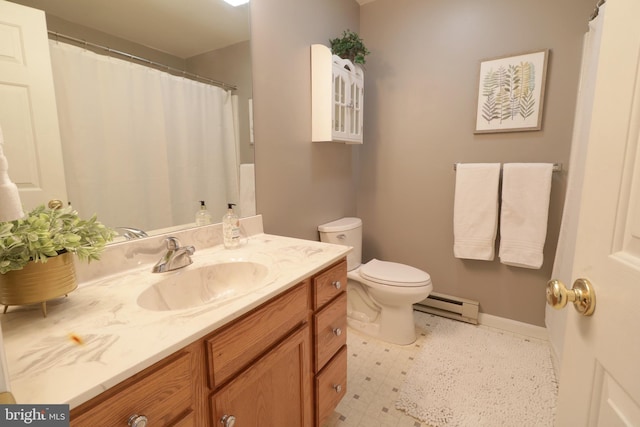 bathroom featuring vanity, toilet, and a baseboard heating unit