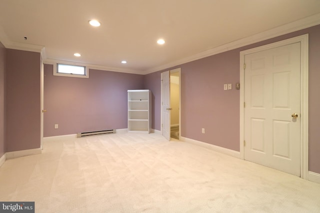 basement featuring light carpet, a baseboard radiator, and crown molding