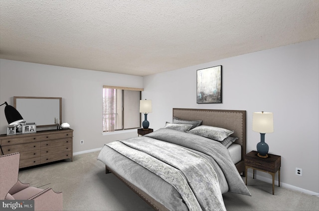 carpeted bedroom featuring a textured ceiling