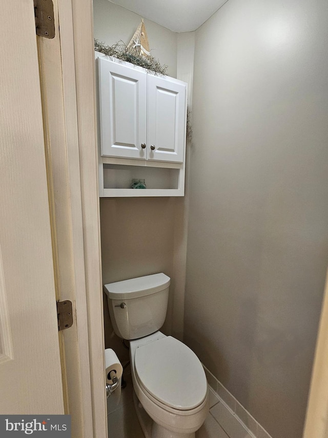 bathroom featuring toilet