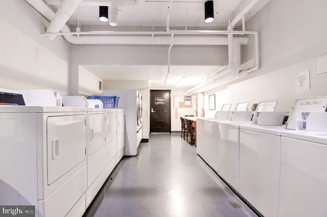 laundry room with washer and dryer