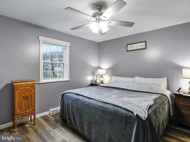 bedroom featuring hardwood / wood-style floors and ceiling fan