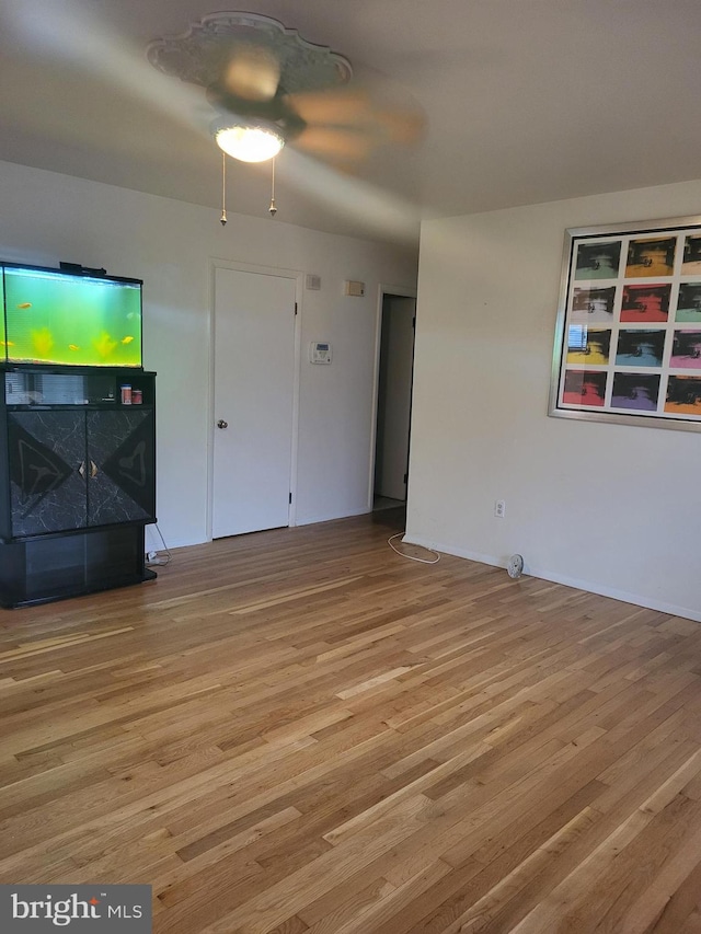 unfurnished living room featuring light wood-type flooring