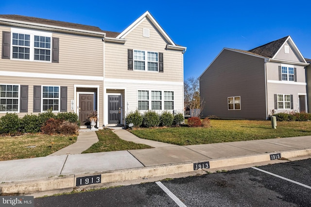 view of front of home featuring a front lawn