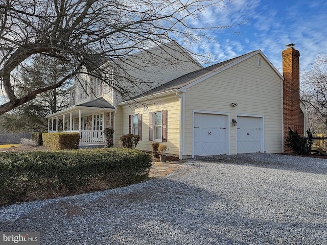 view of side of home with a garage