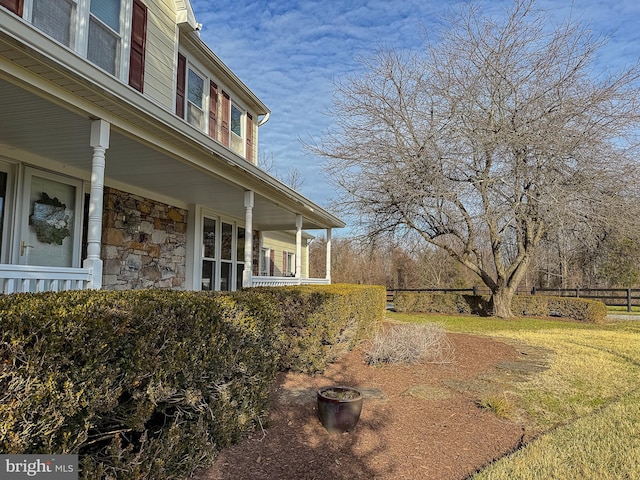 view of yard with a porch