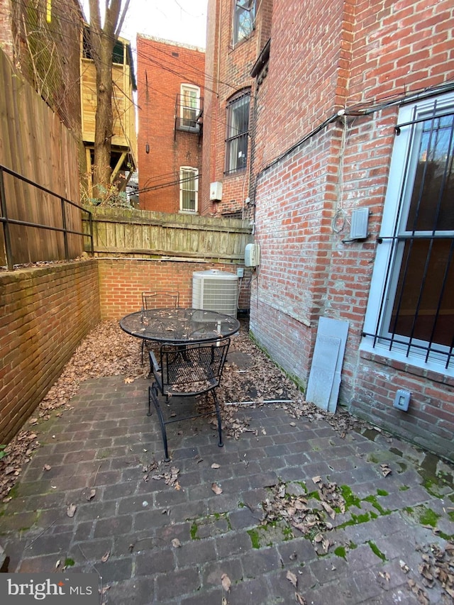 view of patio featuring central AC unit